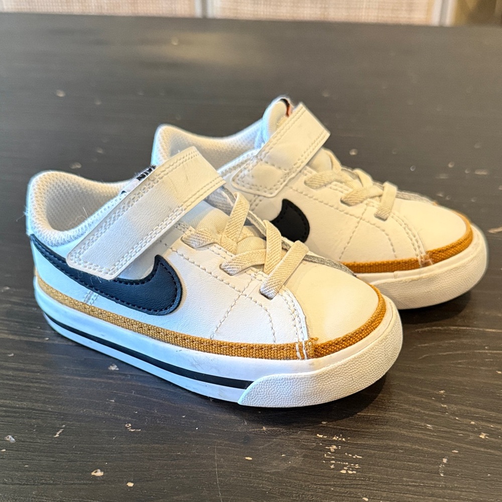 Nike Kids White and Gold Sneakers with Black Accents